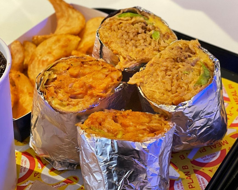 instagram account panda.swo posting of burritos cut in half with a side of potato wedges from korean franchise meal plan b