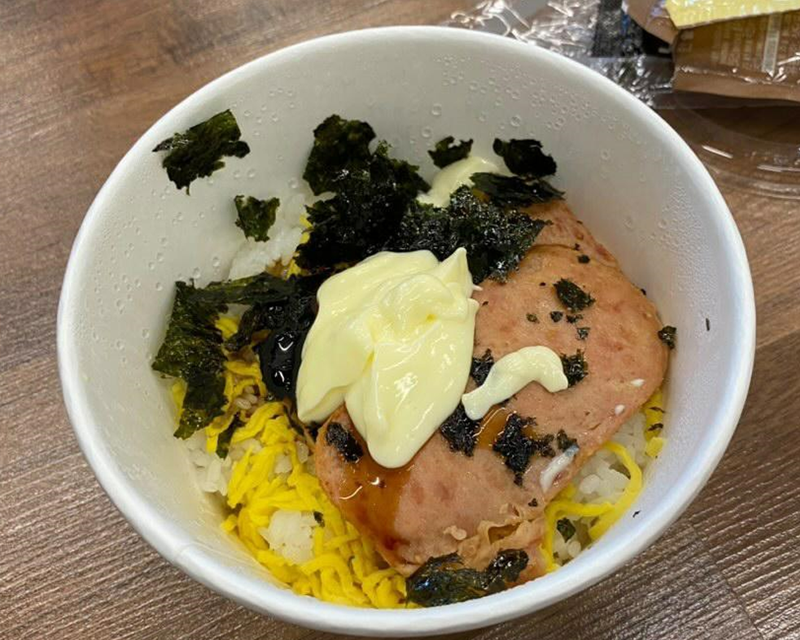 bowl of meat, mayo, rice, and egg from korean franchise hansot