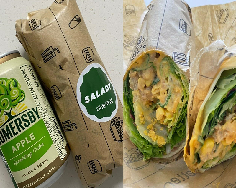 side by side images of wrap in wrapping paper and wrap cut in half from korean franchise salady