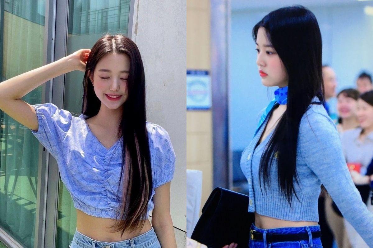 Người mặc áo crop top xanh lam nhạt đi kèm với áo len mỏng, tạo điểm nhấn thời trang trẻ trung, năng động.