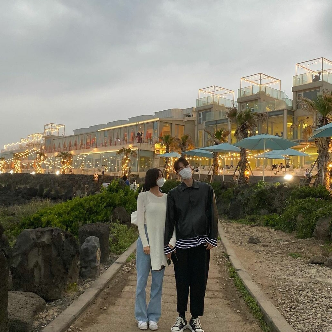 couples standing infront of Hiend Jeju resort