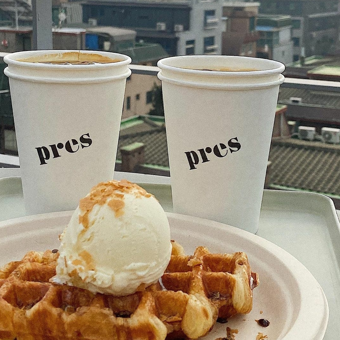 coffee and croffle served on a table at Pres Coffee