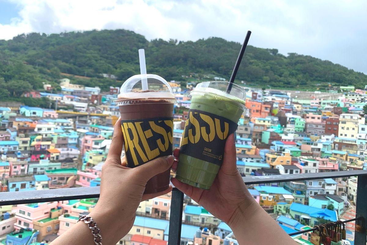 Mocha Ice Blended and Green Tea Latte in front of Gamcheon