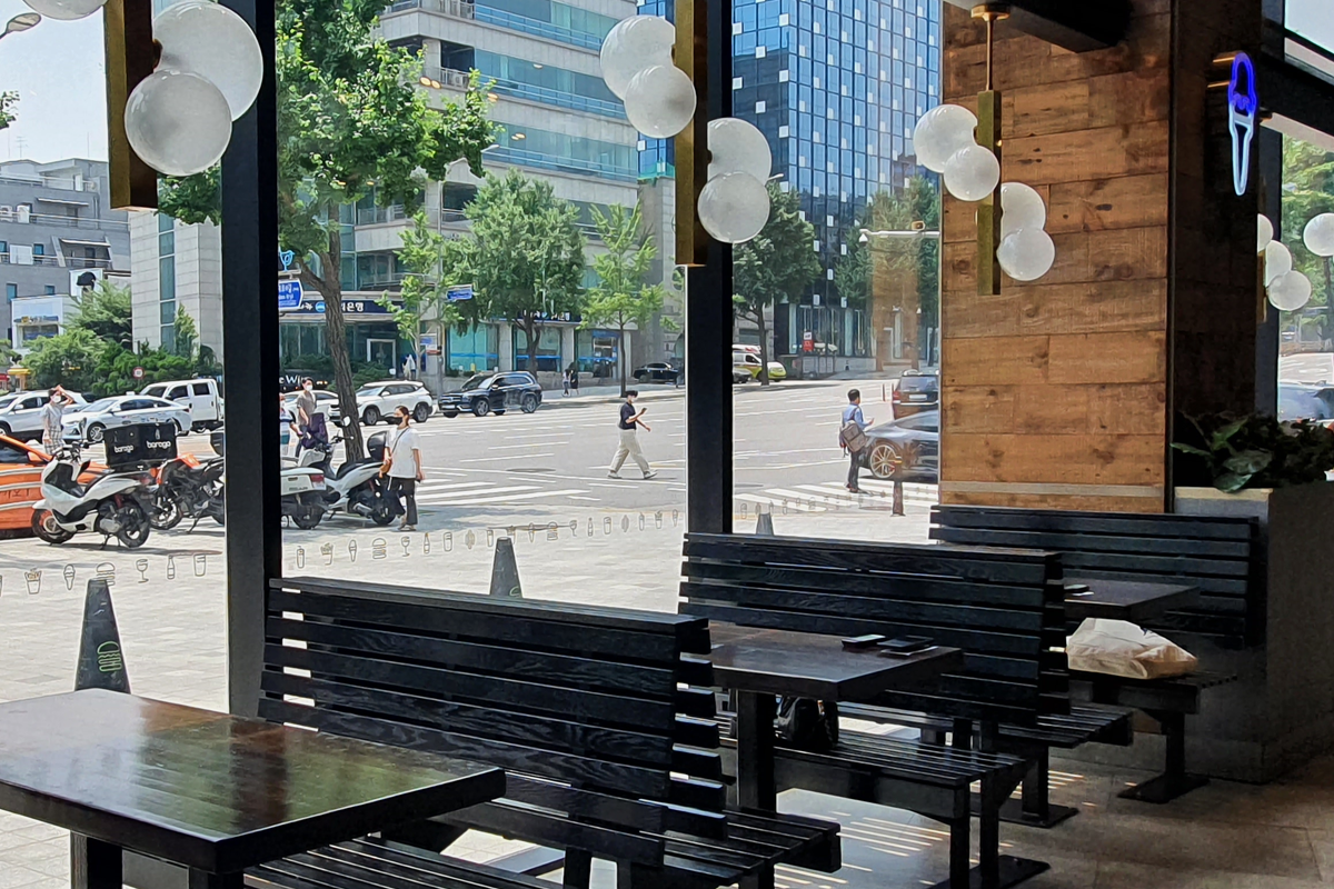 Interior shot of places to sit at Shake Shack