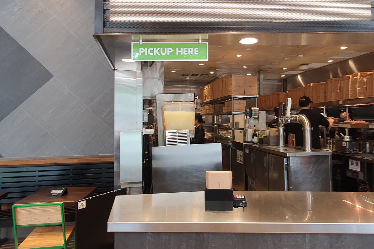 Area where customers can pick up their order at Shake Shack