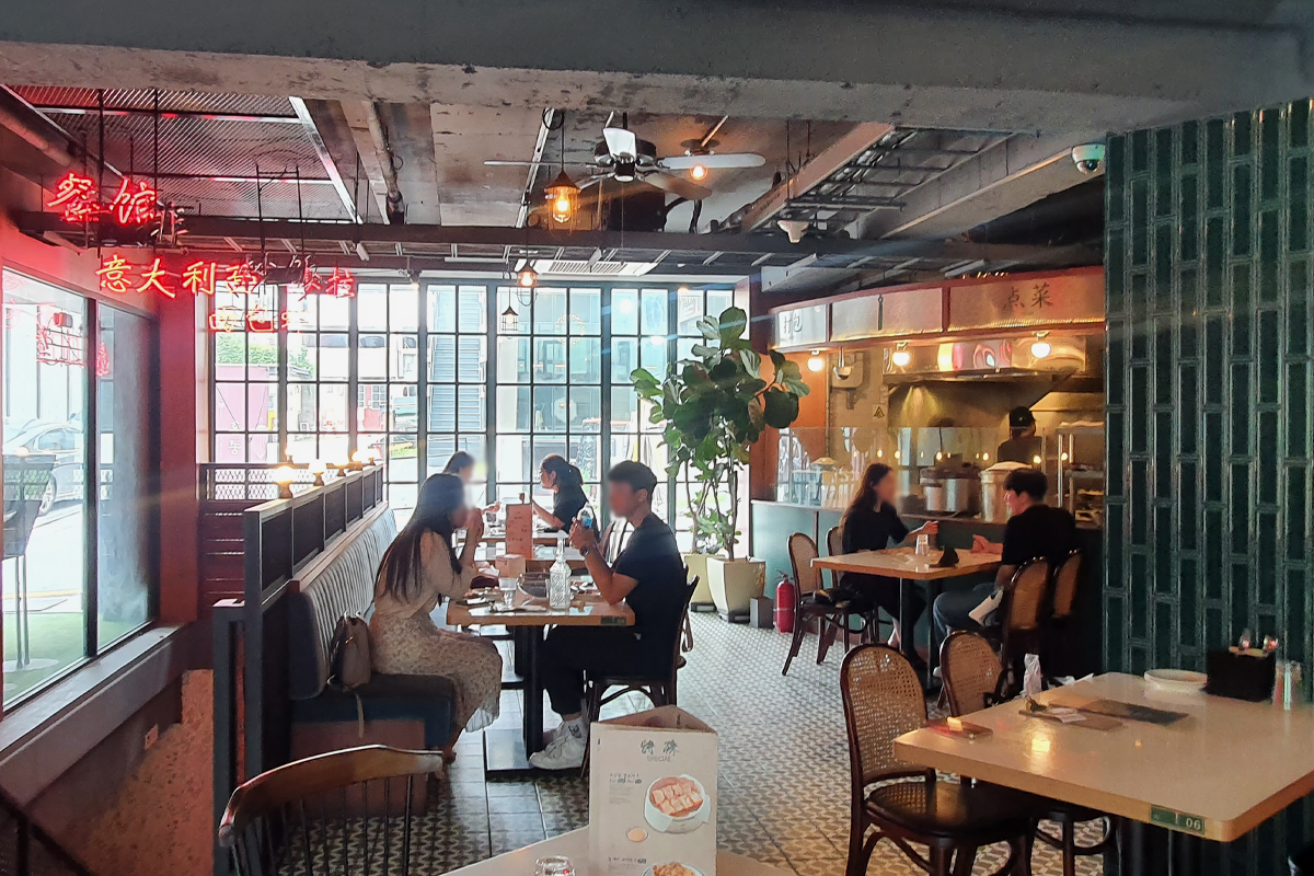 Customers enjoying their meal at restaurant in Seoul