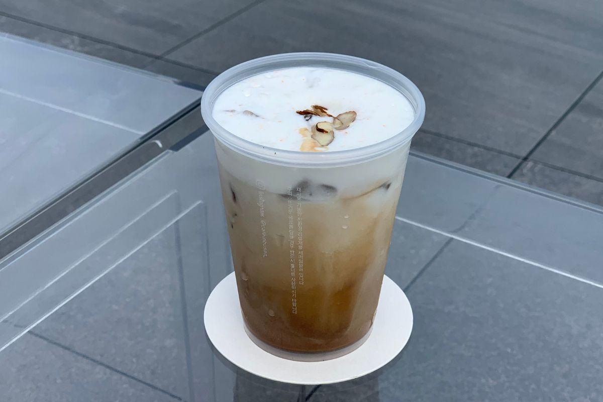 Butterscotch latte from Cafe In Busan on the glass table