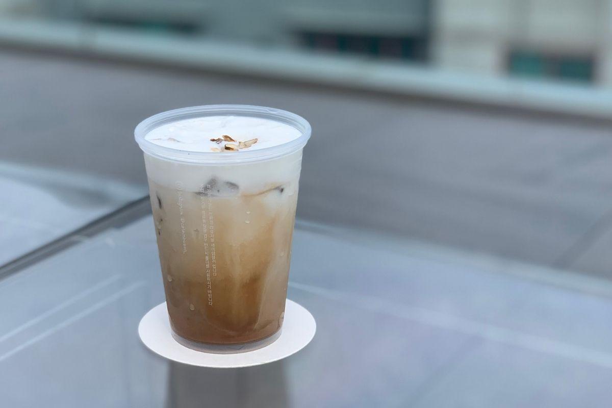 Butterscotch latte from Cafe In Busan on the glass table
