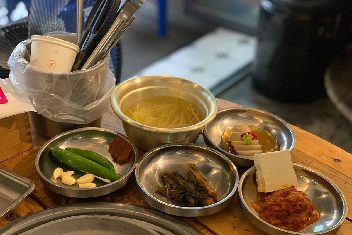 Korean side dishes on table at restaurant