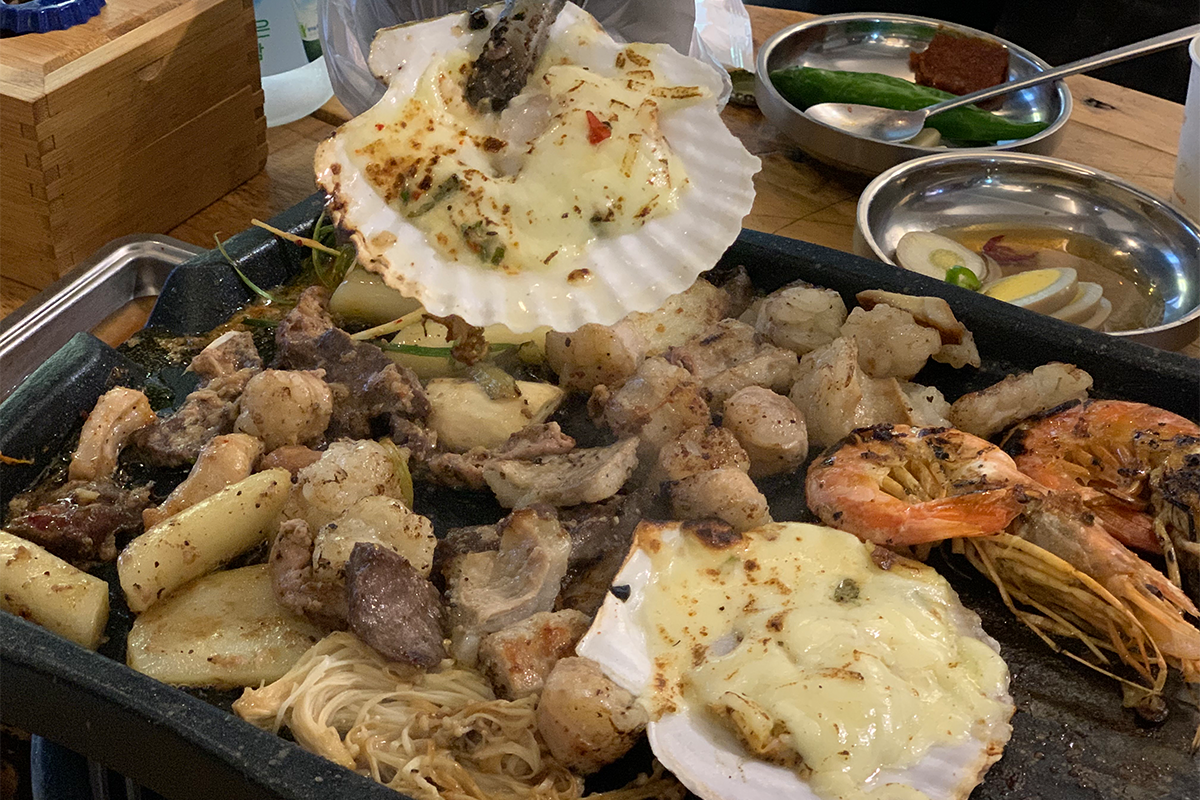 Close up shot of food being done cooking on grill
