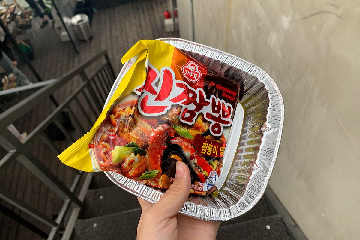 Package of ramyeon noodles with cooking dish