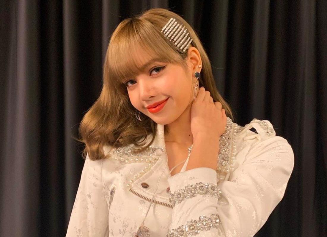 ลิซ่า แบล็กพิ้งก์ ภาพเบลอในฉากหรูหราขณะสวมเสื้อแจ็คเก็ต