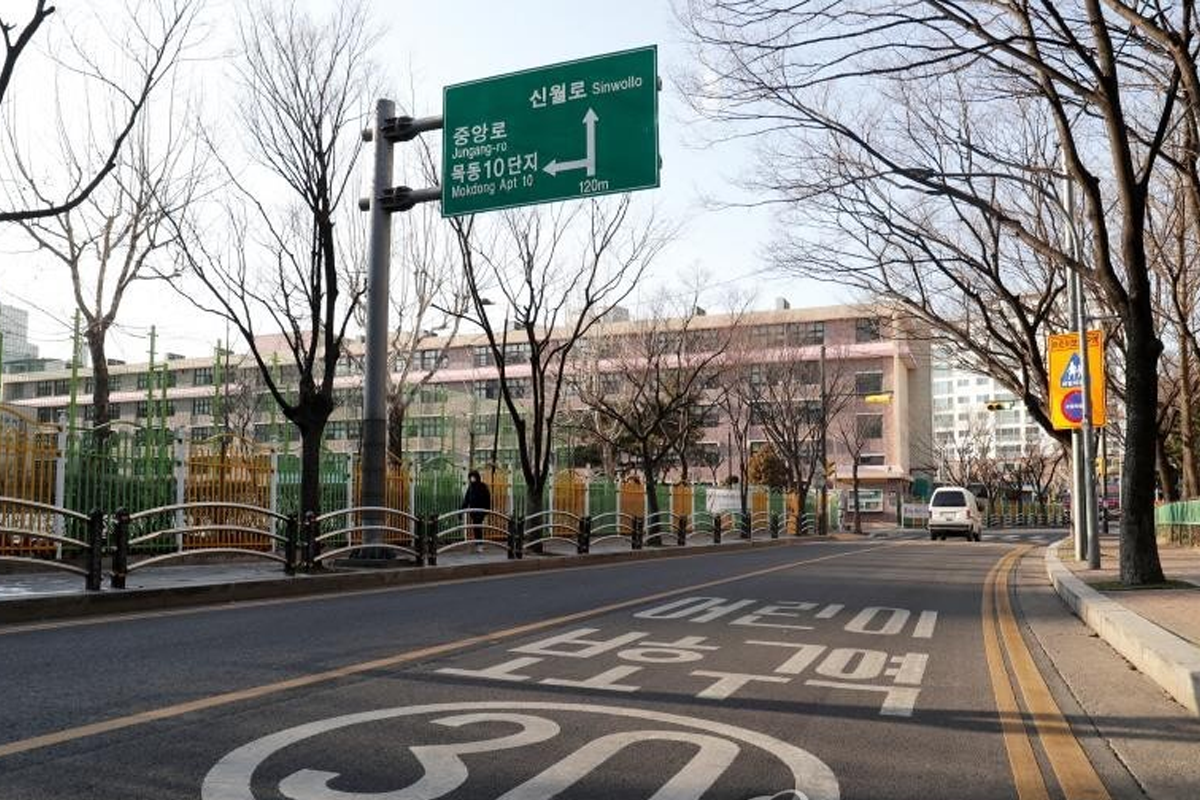 Korean road school zone view of a school in the distance