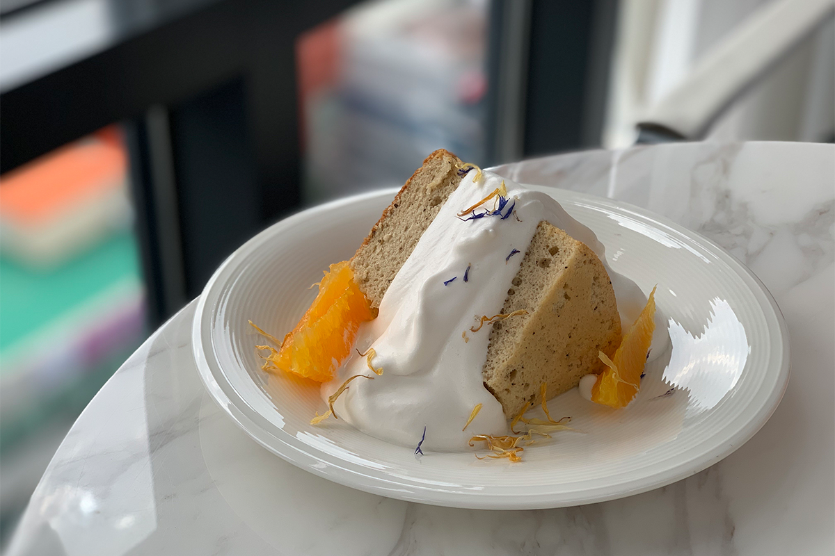 orange earl gray chiffon cake on a white plate at Space & Mood Busan