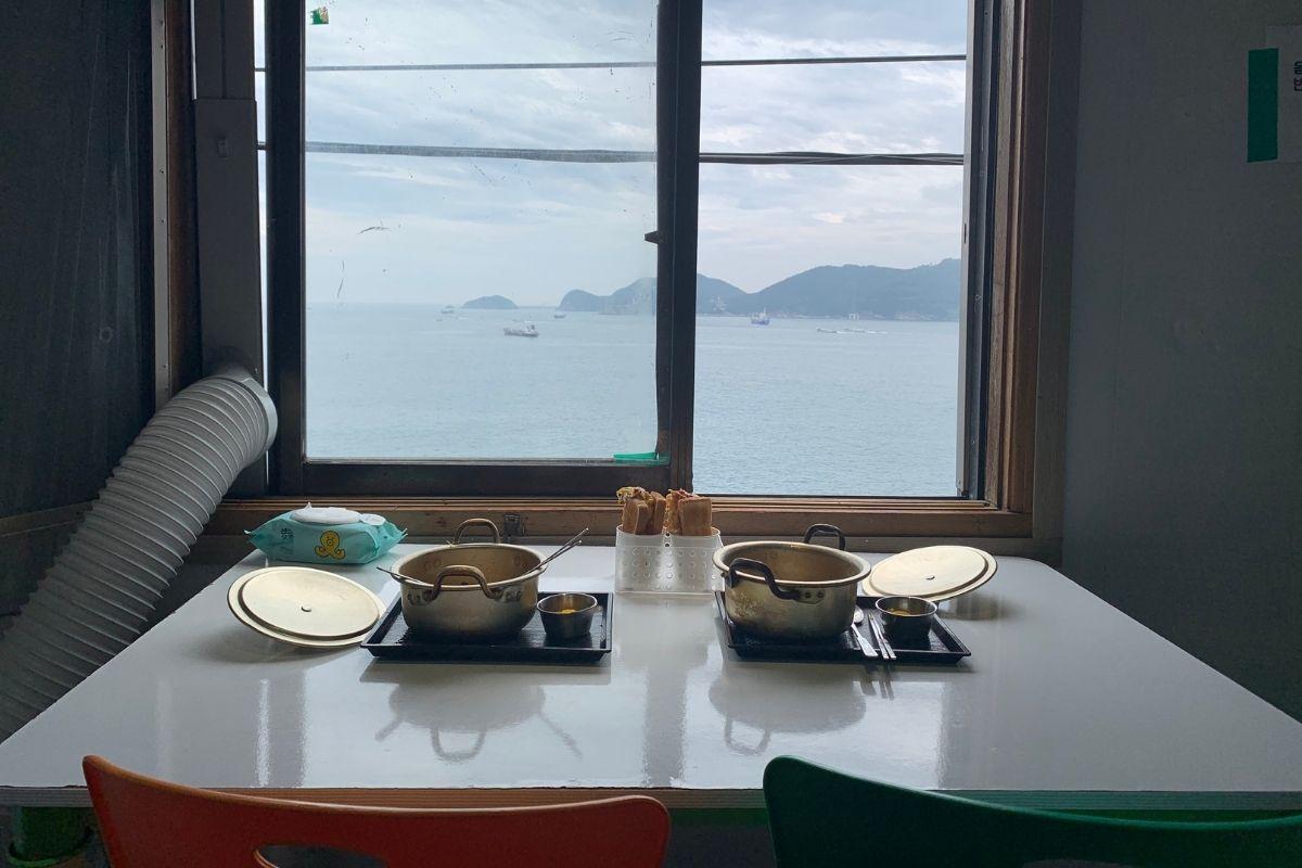 ramyun on table by window at Huinnyeoul Jeombbang