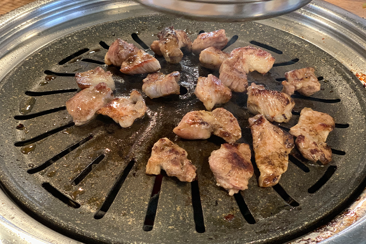 Smaller cuts of meat on grill