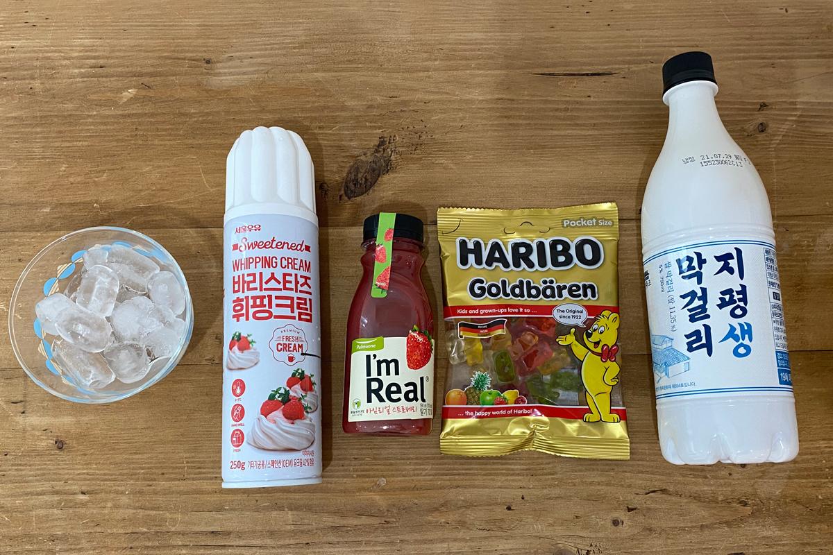 Ingredients needed for makgeolli cocktail with strawberry juice