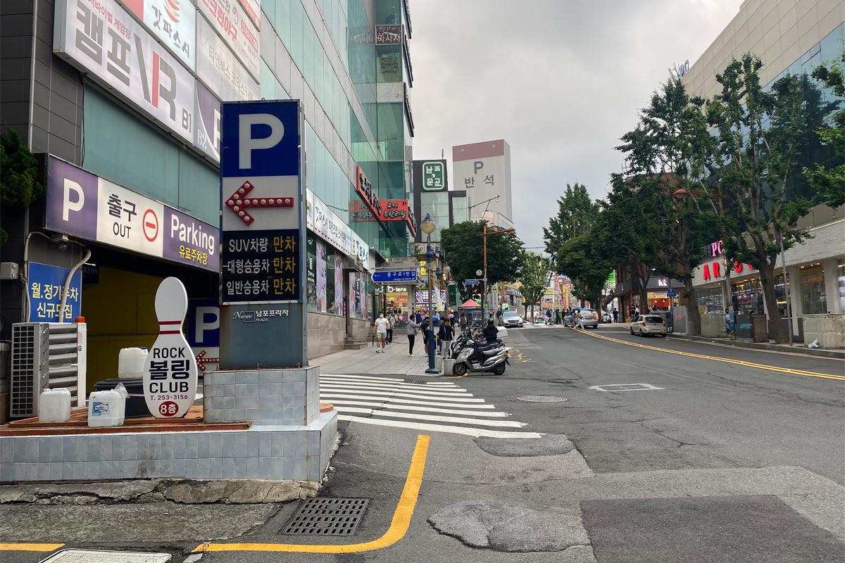 Busan Korea Nampodong Jagalchi, daytime city scene, parking lot, roads and buildings