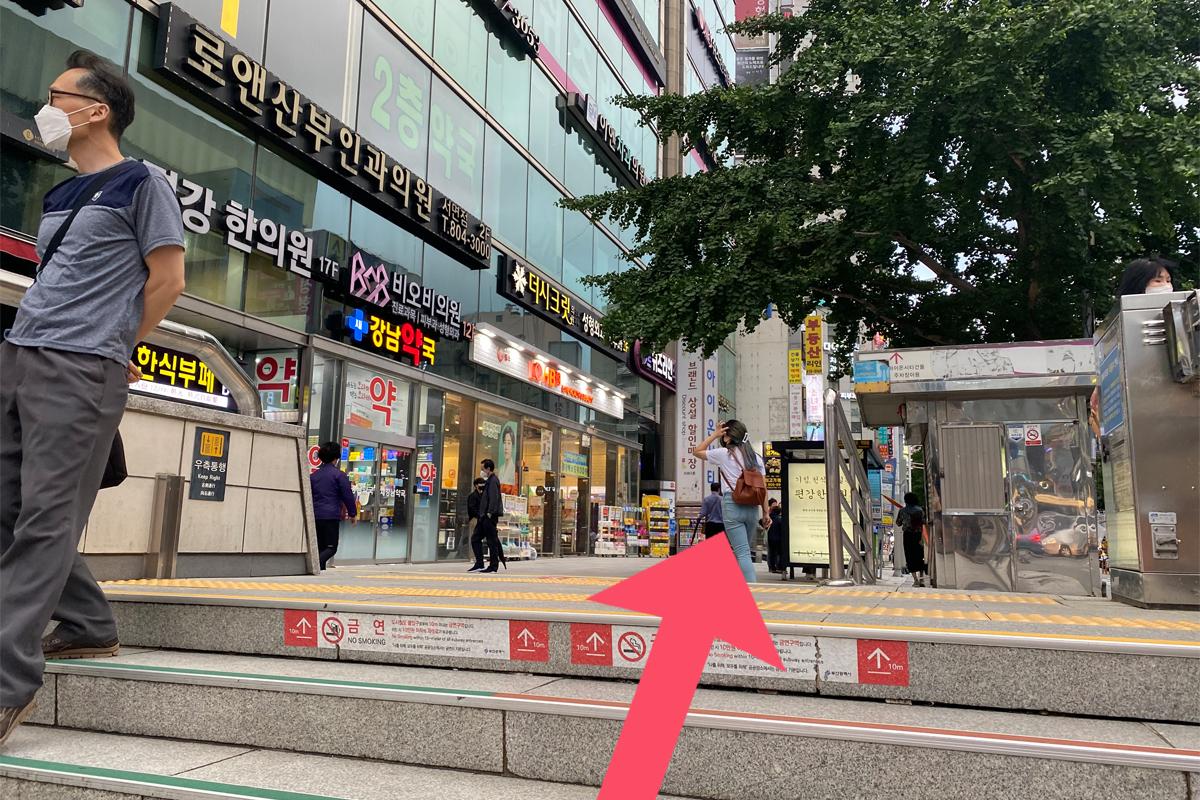 Busan Korea Seomyeon subway station exit, city buildings, people walking