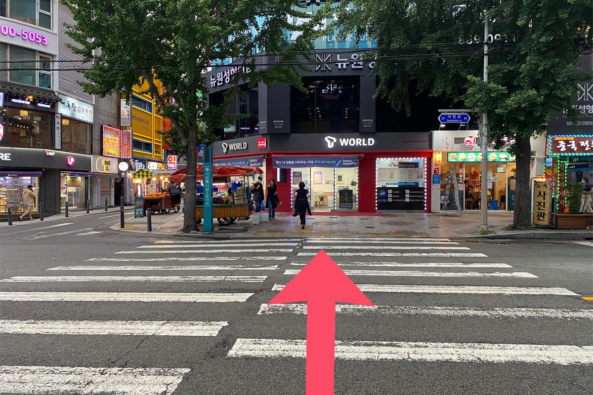 Busan Korea Seomyeon, city buildings, people walking, crosswalk, road