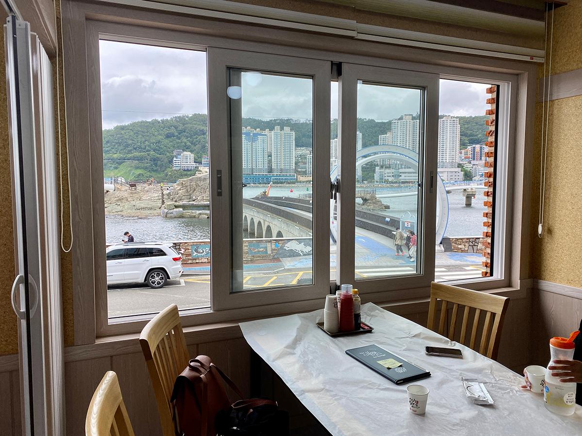 A restaurant in Busan looks out to the Songdo Beach ocean