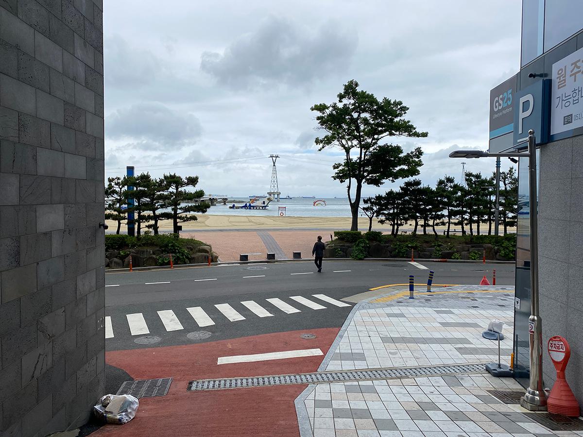 Songdo Beach seen in between two buildings