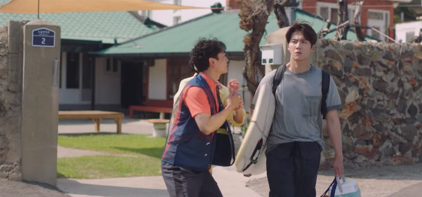 Chief Hong in front of his house in Hometown Cha-Cha-Cha