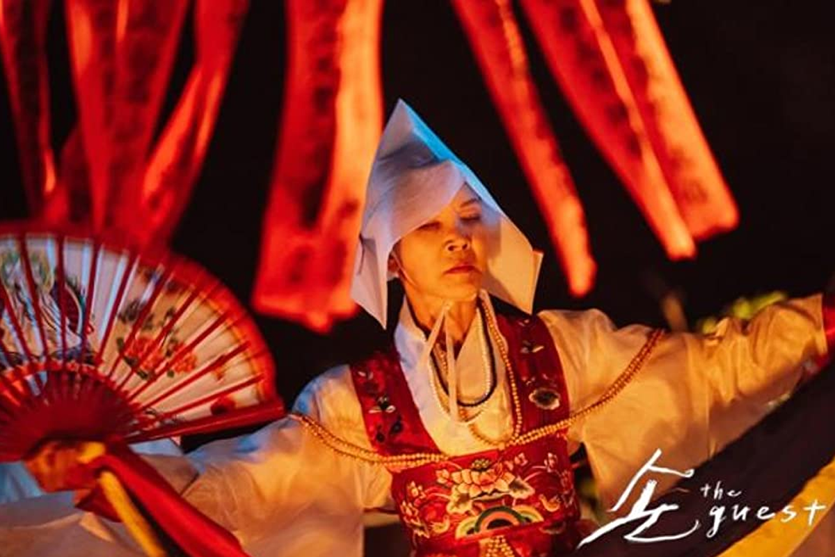 Korean shaman, mudang, performing a rite