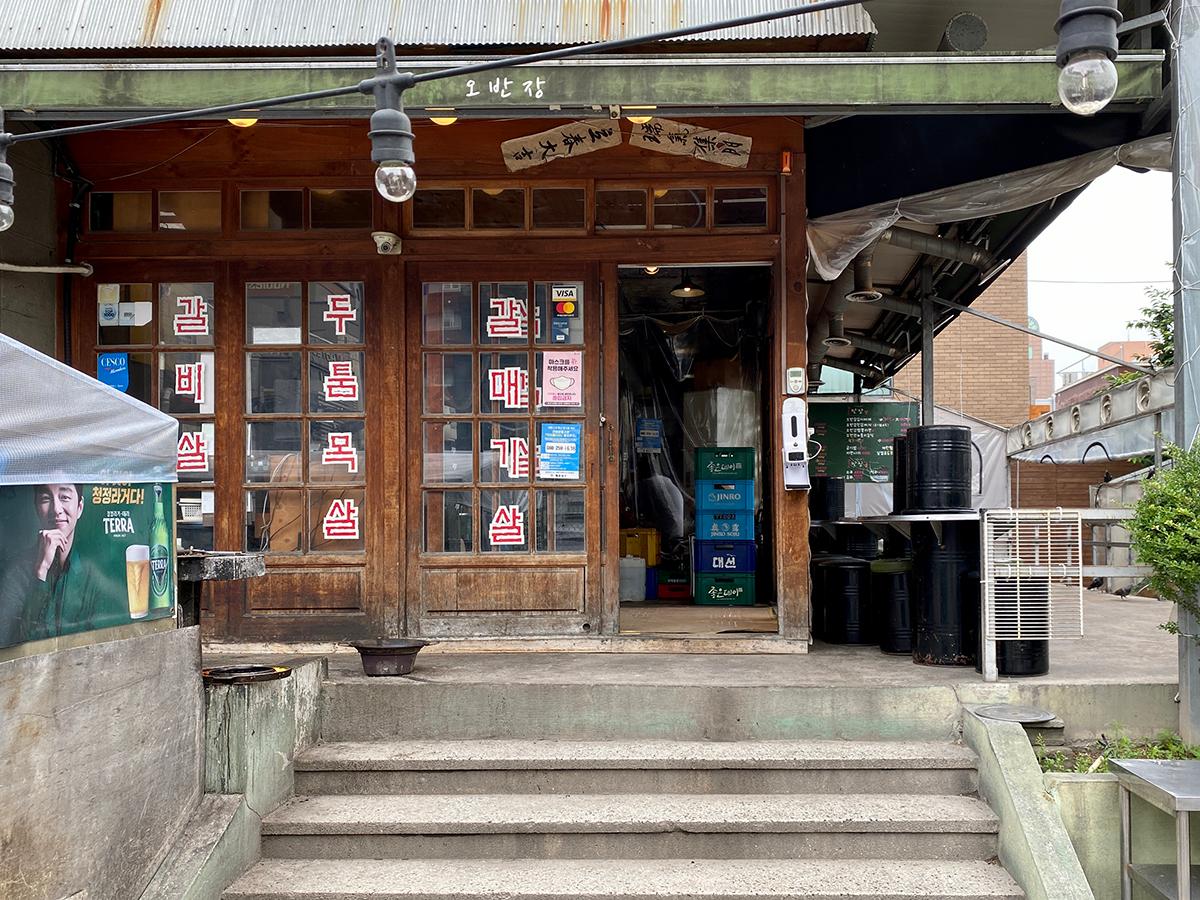 Exterior with wooden sliding doors at Obanjang, a bbq place in Haeundae