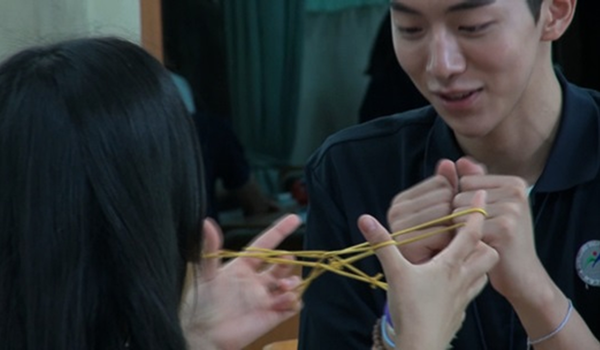 Korean drama playing a Knitting Thread game with their hands