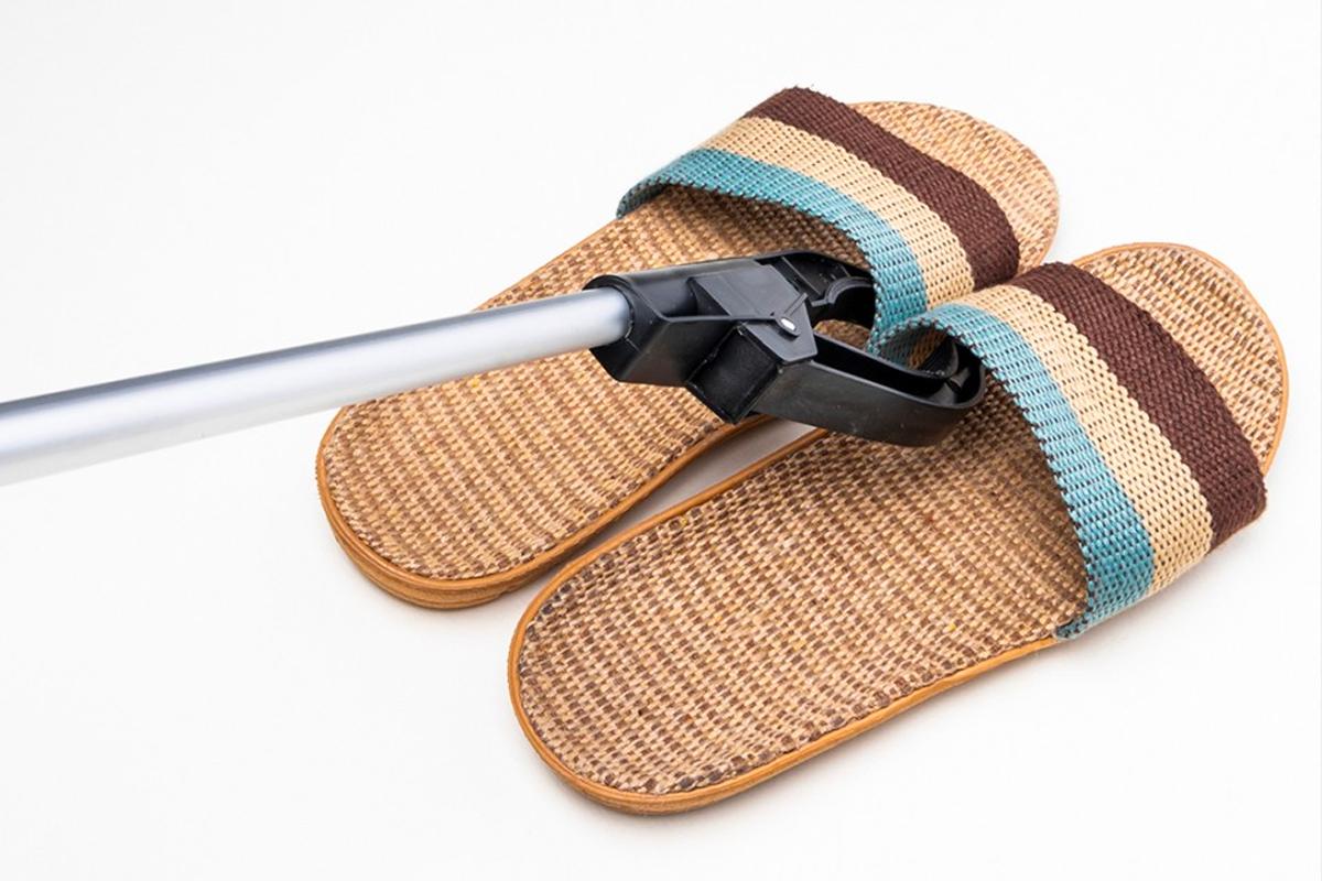 Multi-purpose Tongs to move dirty shoes