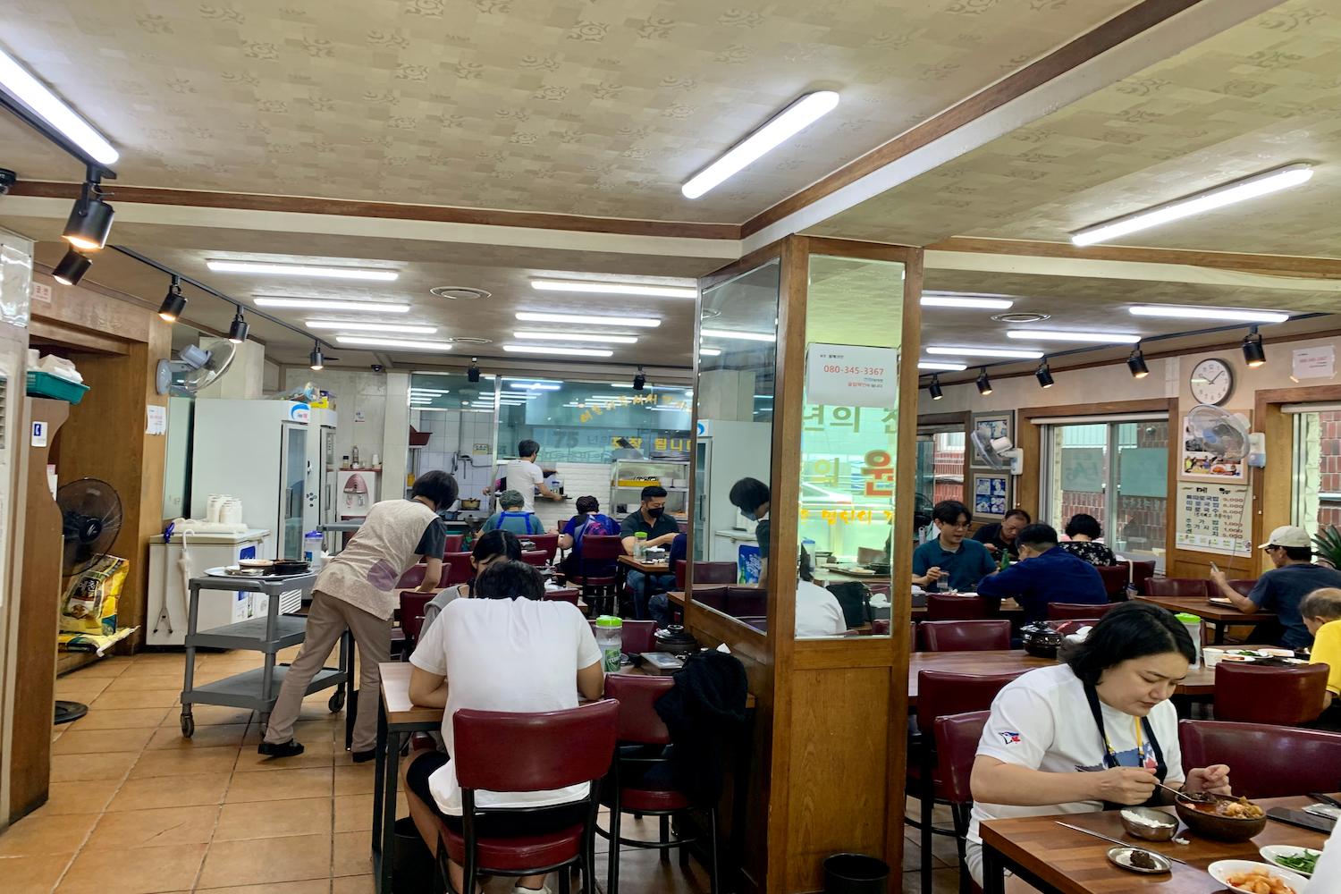 people at ttaro gukbap restaurant