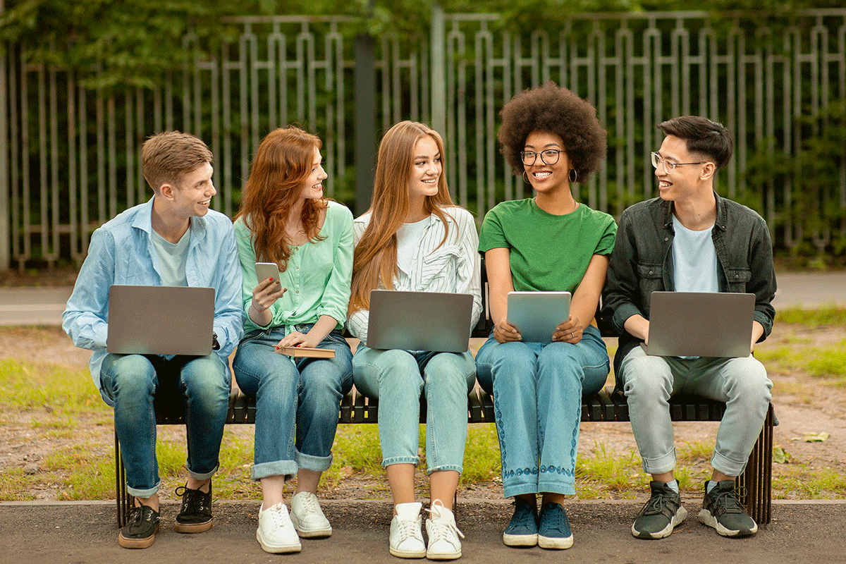 Study group members sitting on a bench