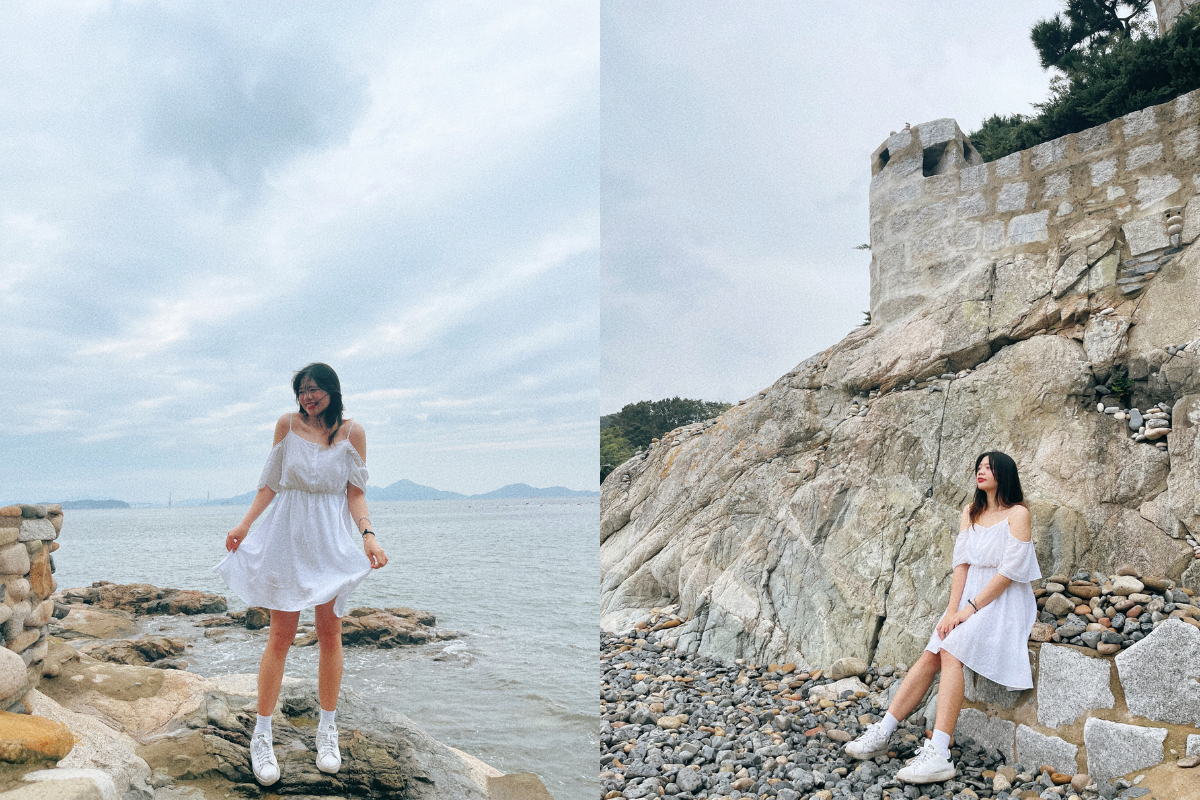 Girl posing in front of Maemi Castle on Geoje Island