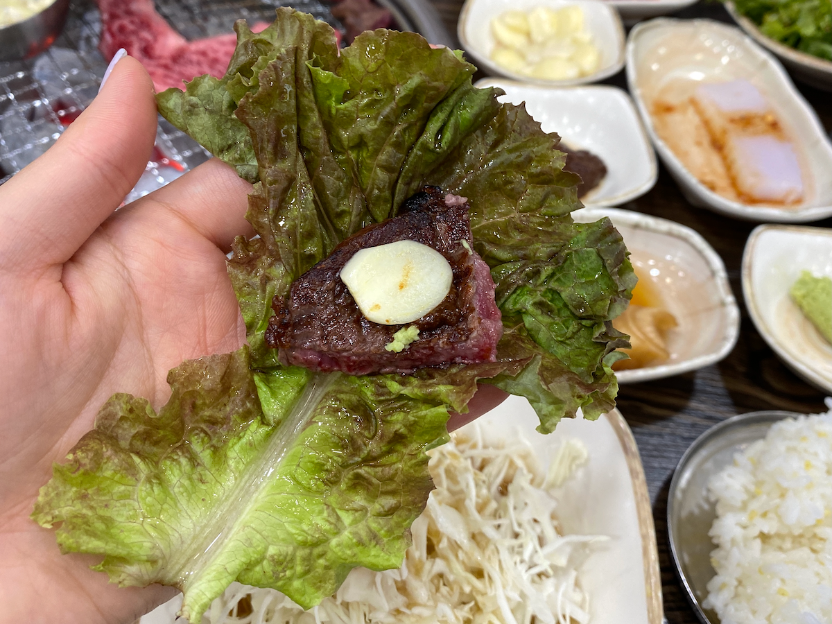 Wrapping meat in vegetable (Korean food)