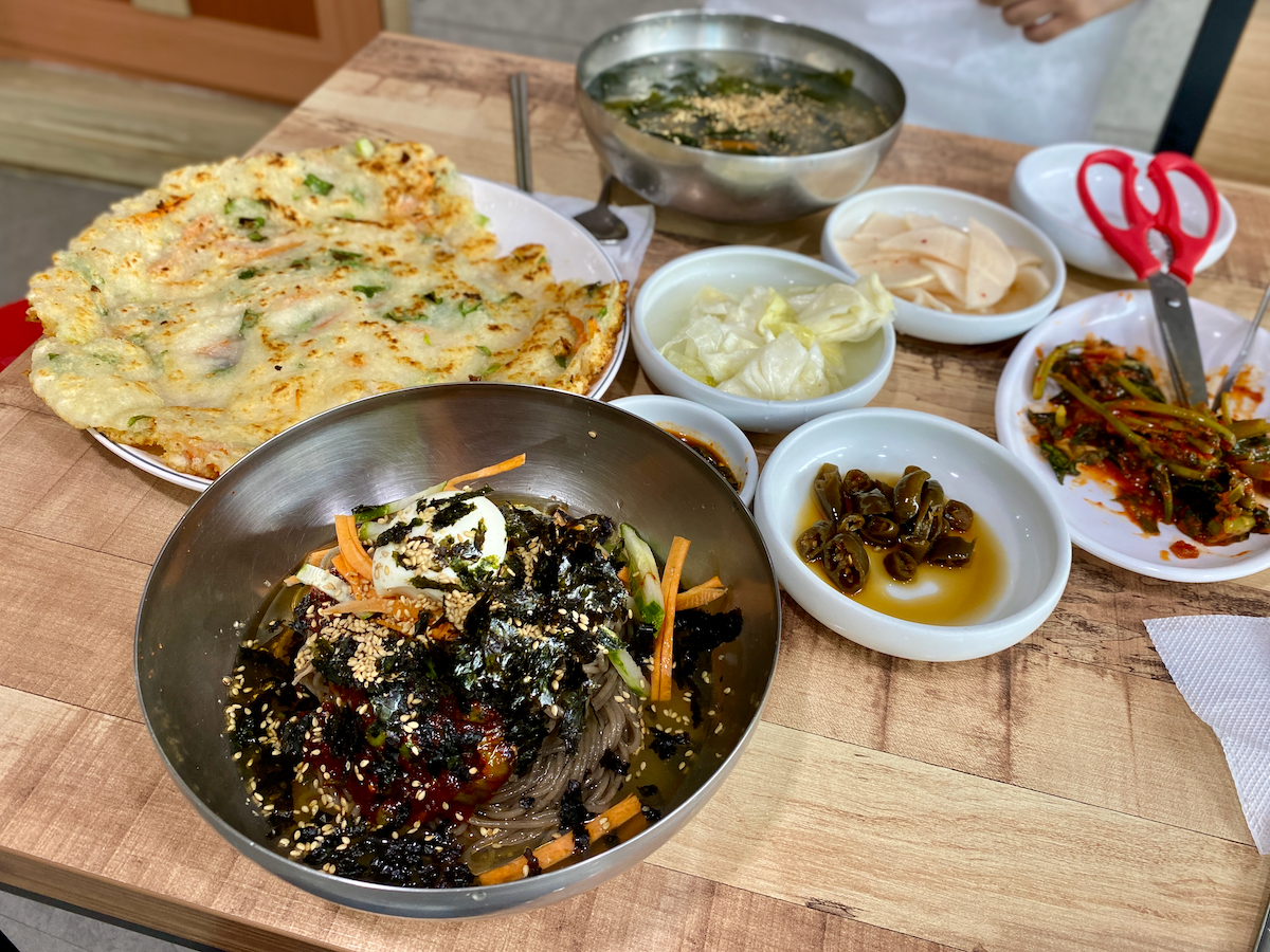 makguksu (buckwheat noodles), gamjajeon (potato pancakes) and side dishes at Cheongtaesan Makguksu in Gangwondo