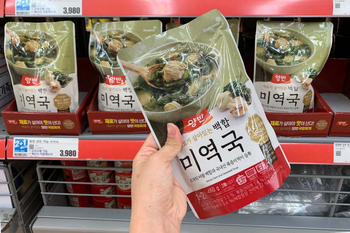 Holding Dongwon Clam Seaweed Soup