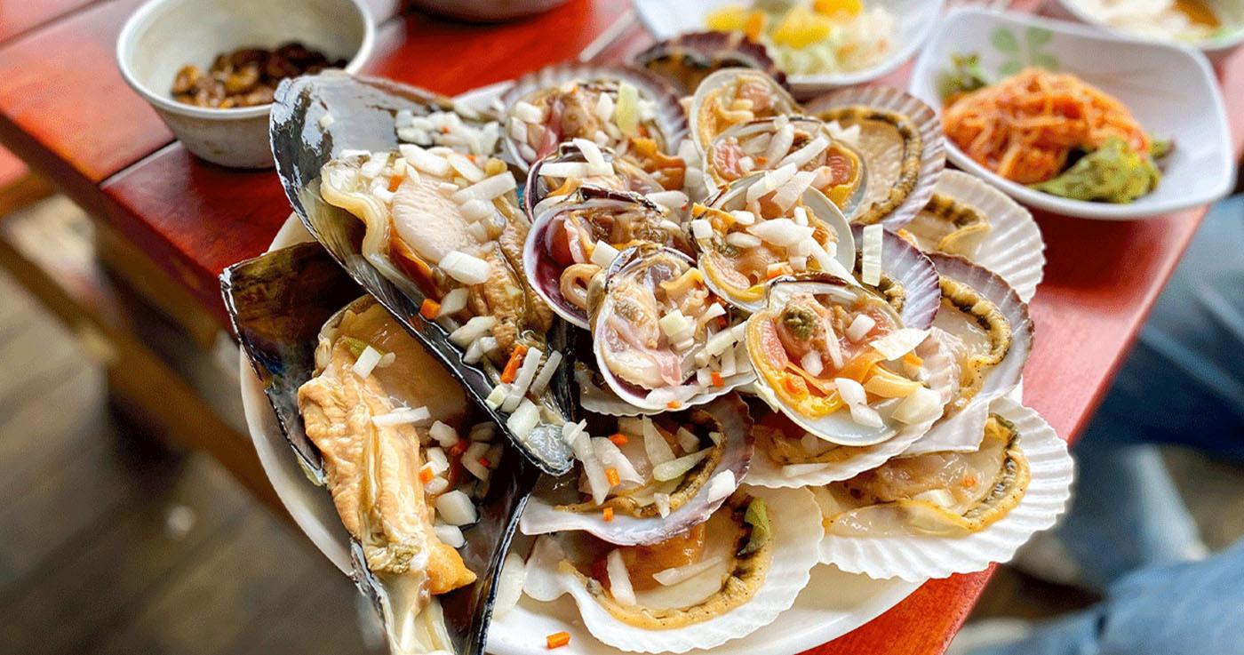 Mipo Kkeutjib | Delizioso ristorante di vongole alla griglia a Busan