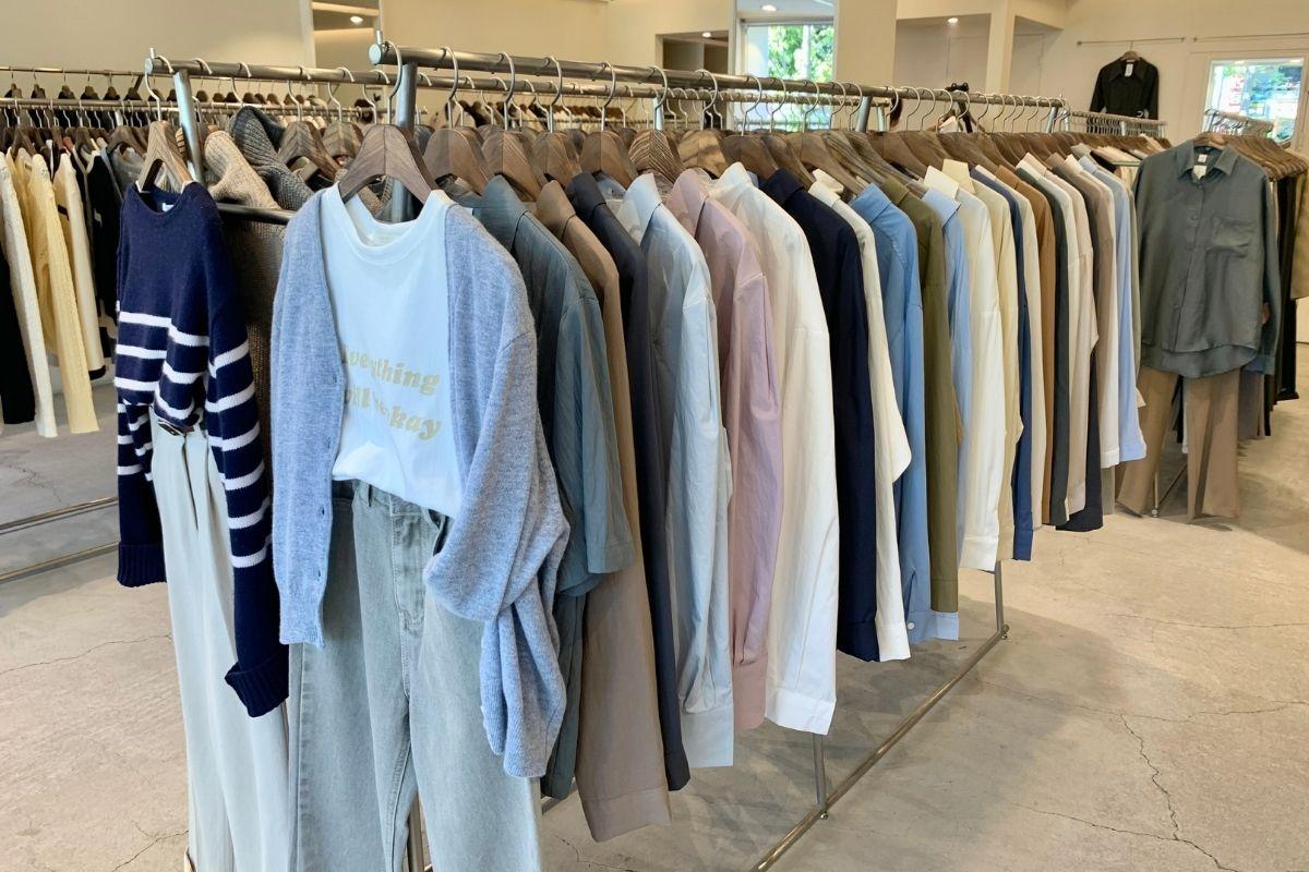 Clothing racks at yellow clothes shop