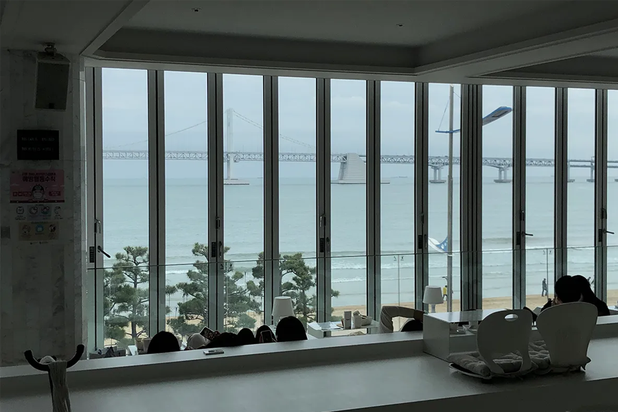 busan korea gwangalli beach cafe, byul bed interior, big windows