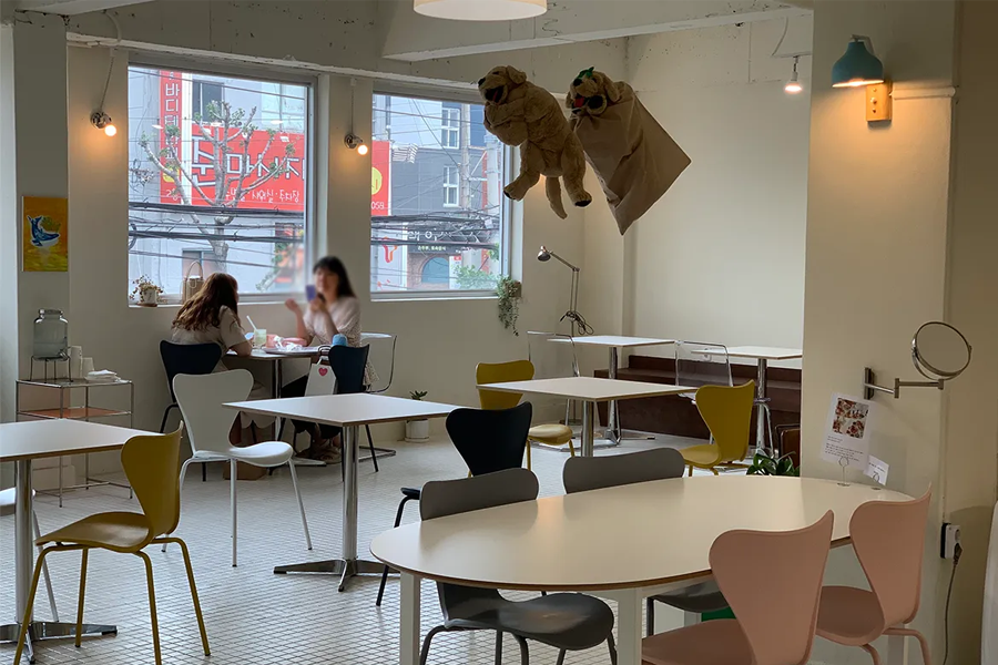 busan korea gwangalli beach cafe, the same age couple interior