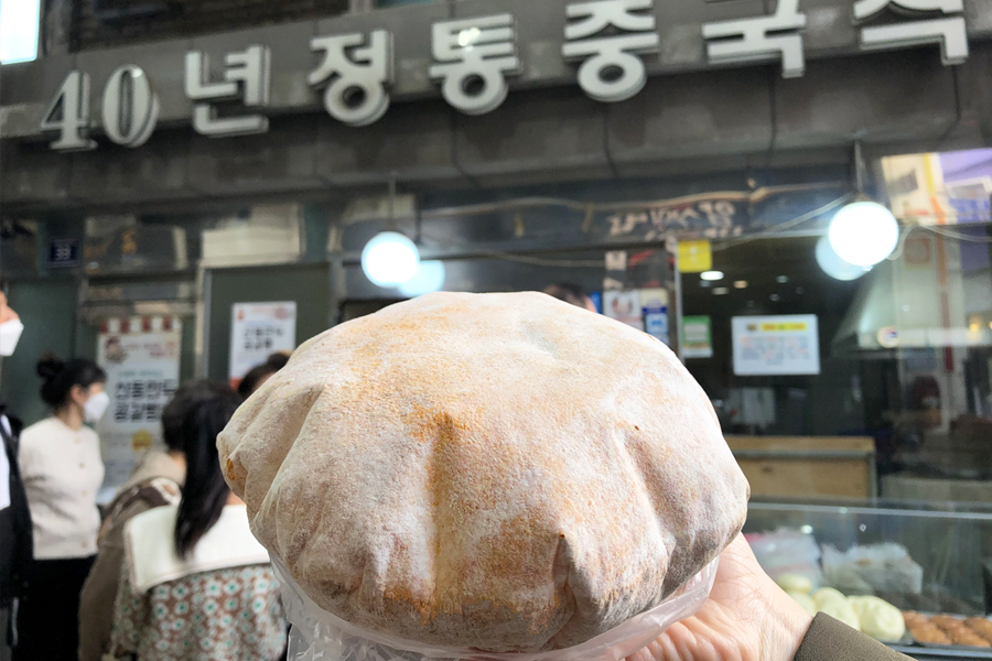Gonggal Bread from Shandong Dumplings, a local favorite at Sinpo International Market in Incheon, featuring a crispy texture.