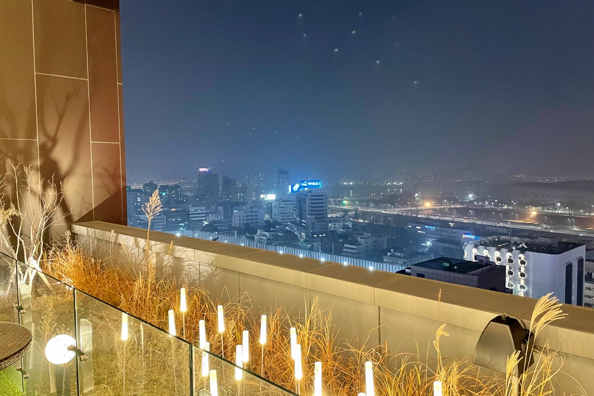 The night view of the city from the terrace of the 21st floor bar.