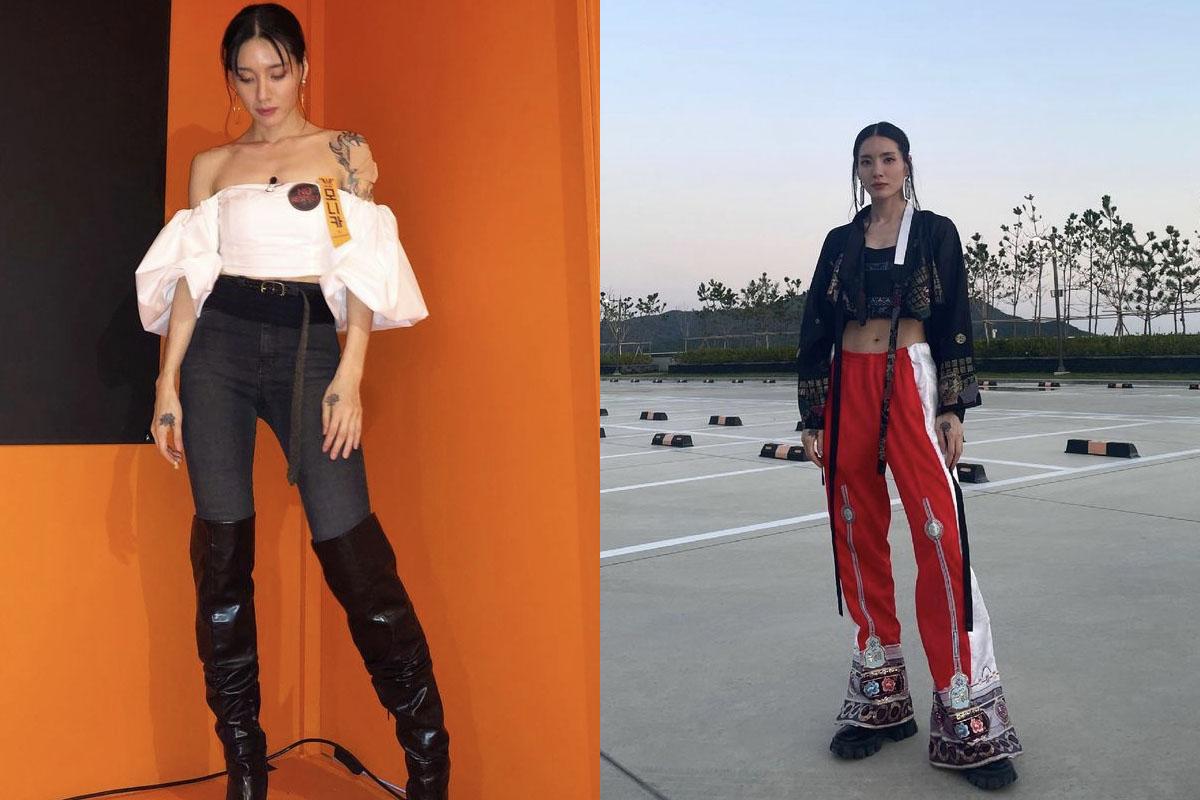 Monika以露肩上衣和緊身牛仔褲裝扮，強調腿長比例，展現時尚魅力風采。