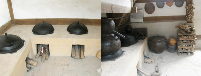 傳統韓國韓屋的廚房設計，顯示中式火爐和用作儲存和烹煮的陶特殊。 - 韓式傳統廚房