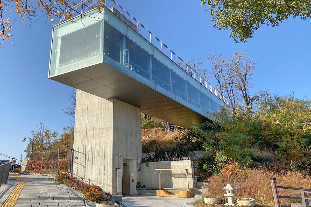 Modern design of Changsin Sungin Quarry Observatory in Seoul set against a clear blue sky