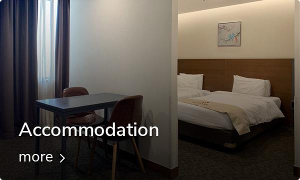 Gemütliches Hotelzimmer in Dongdaemun mit moderner Ausstattung und komfortablen Betten.