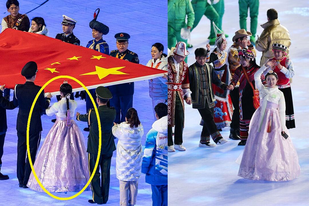 北京冬季オリンピック開会式で、多様な伝統衣装を着た参加者たちと、韓服を身に着けた女性の姿