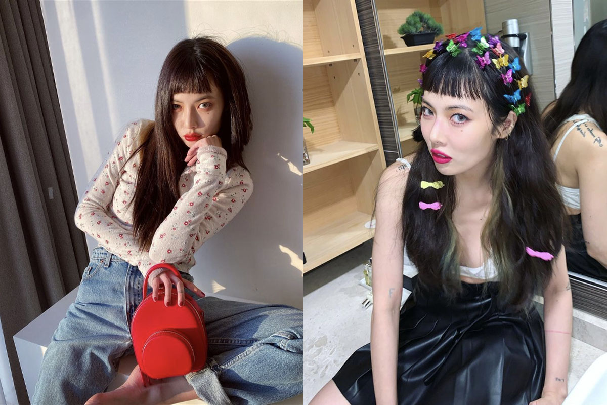 Personne avec une coiffure à frange droite, portant un pull à imprimé floral, mode coréenne.