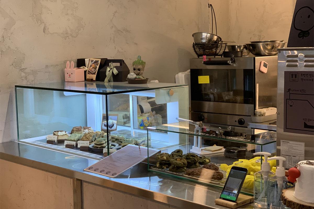 A view of the ordering area and dessert display.